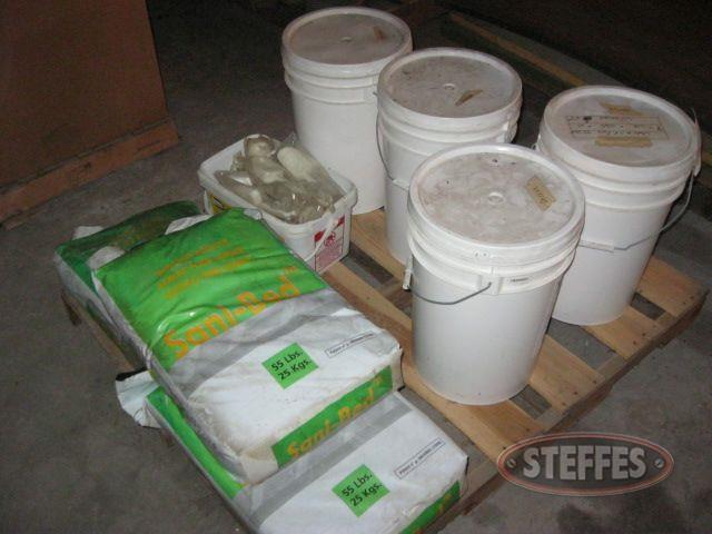 Assortment of containers of Sani-Bed bedding additive,_1.jpg